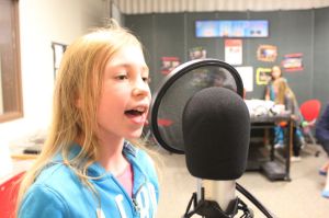 Ella Morrison didn’t seem shy as she belted out the lyrics to her favourite songs during a tour of the Spruce Grove Library’s Innovation Lab on Jan. 16. Morrison was using the library’s GarageBand technology to record her voice. - Karen Haynes, Reporter/Examiner